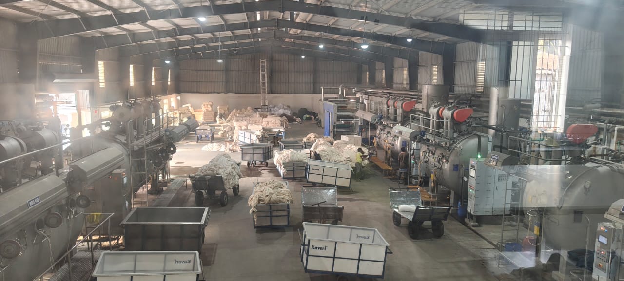 Dyeing unit with soft-flow machines operating under ETP and PPE safety controls
