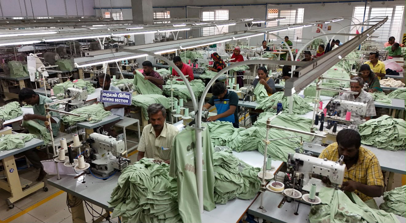 Ayyappa Textiles sewing section with operators assembling a bulk knitwear order